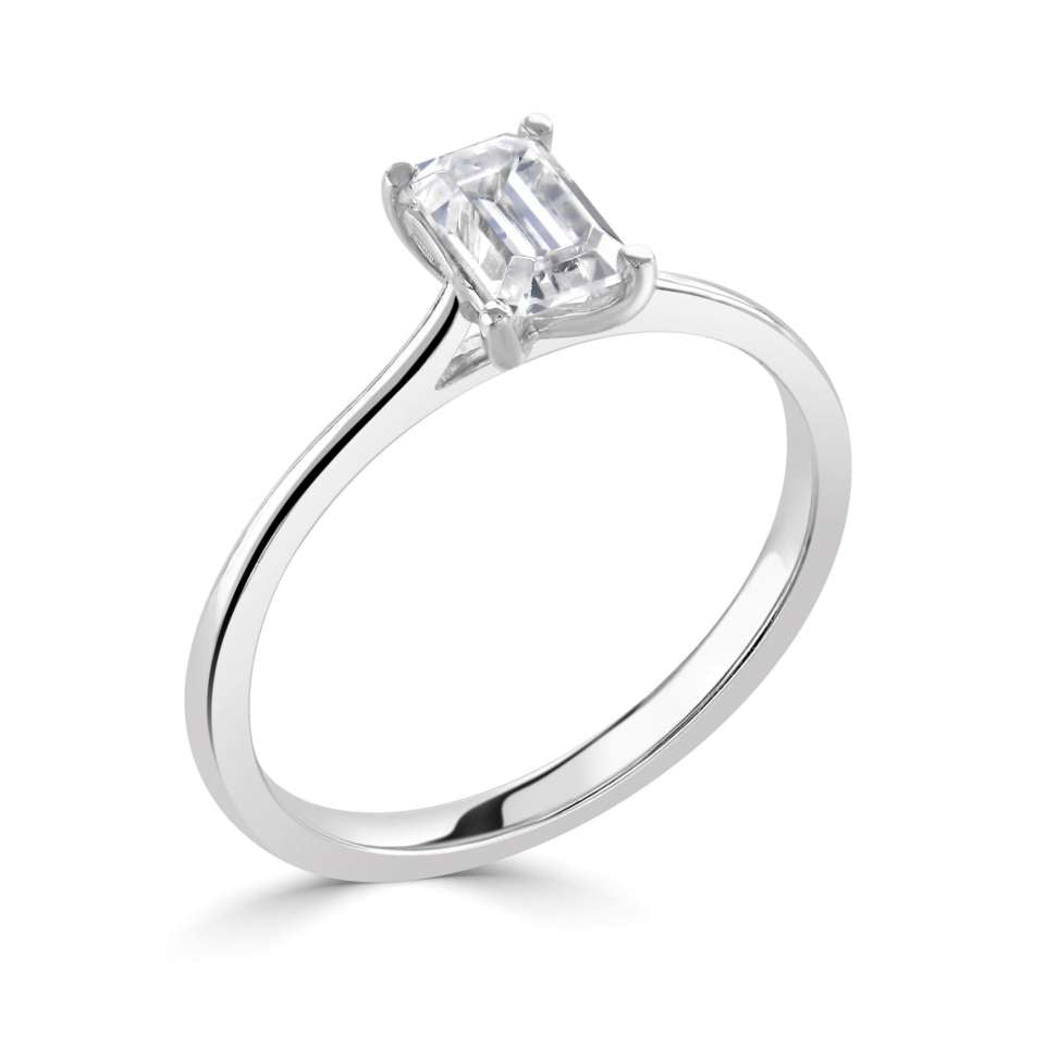 Platinum emerald cut lab diamond solitaire ring with slim band