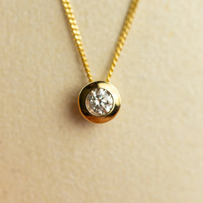 9ct yellow gold bezel set 0.20ct diamond pendant