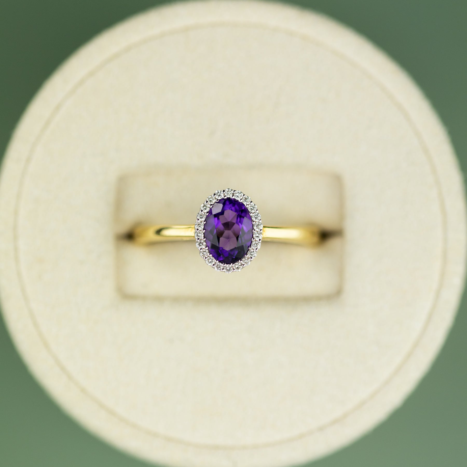 18 Karat Yellow Gold oval Amethyst Ring with Diamond Halo