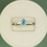 18 Karat White Gold marquise Blue Topaz Halo Ring