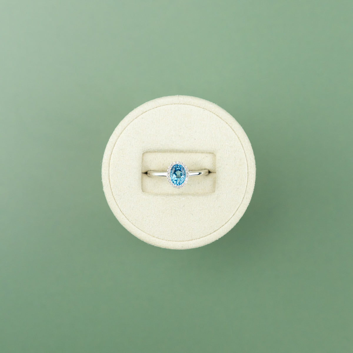 18 Karat White Gold Blue Topaz Halo Ring 0.95ct at RR Jewellers Yarm UK