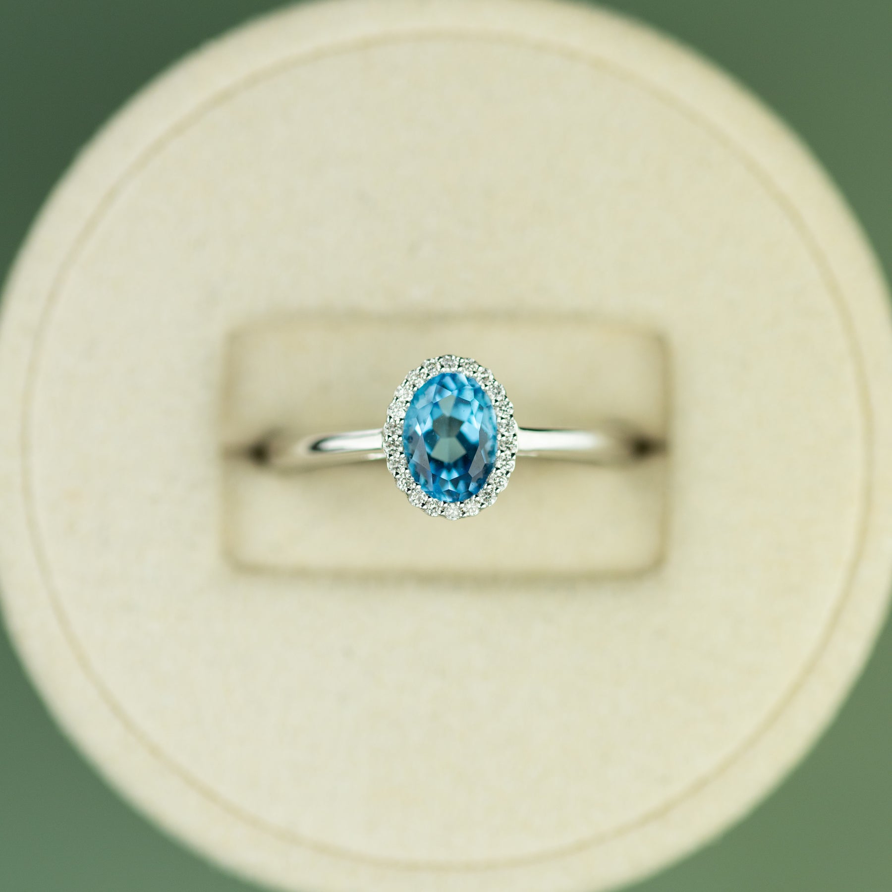 18 Karat White Gold Blue Topaz Halo Ring 0.95ct