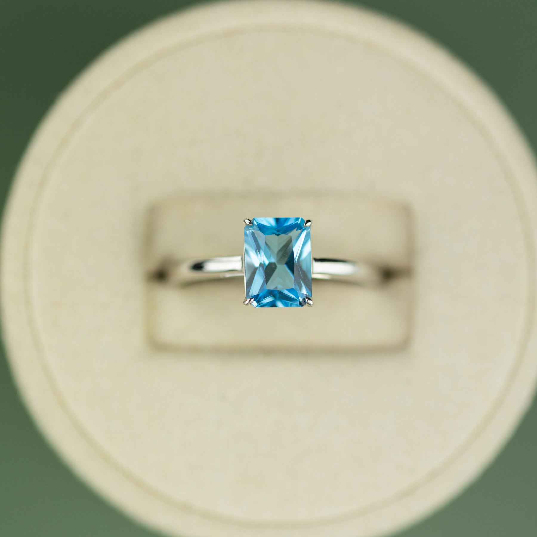 18 Karat White Gold Blue Topaz Emerald Cut Ring 1.40ct at RR Jewellers Yarm UK