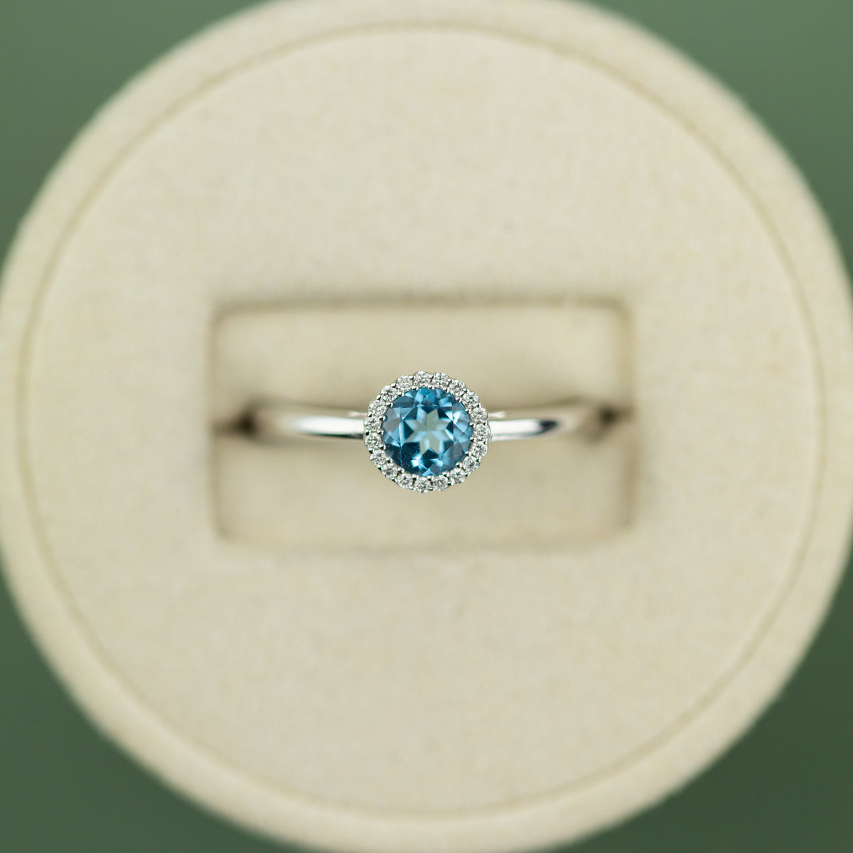 18 Karat White Gold Blue Topaz Round Halo Ring 0.56ct