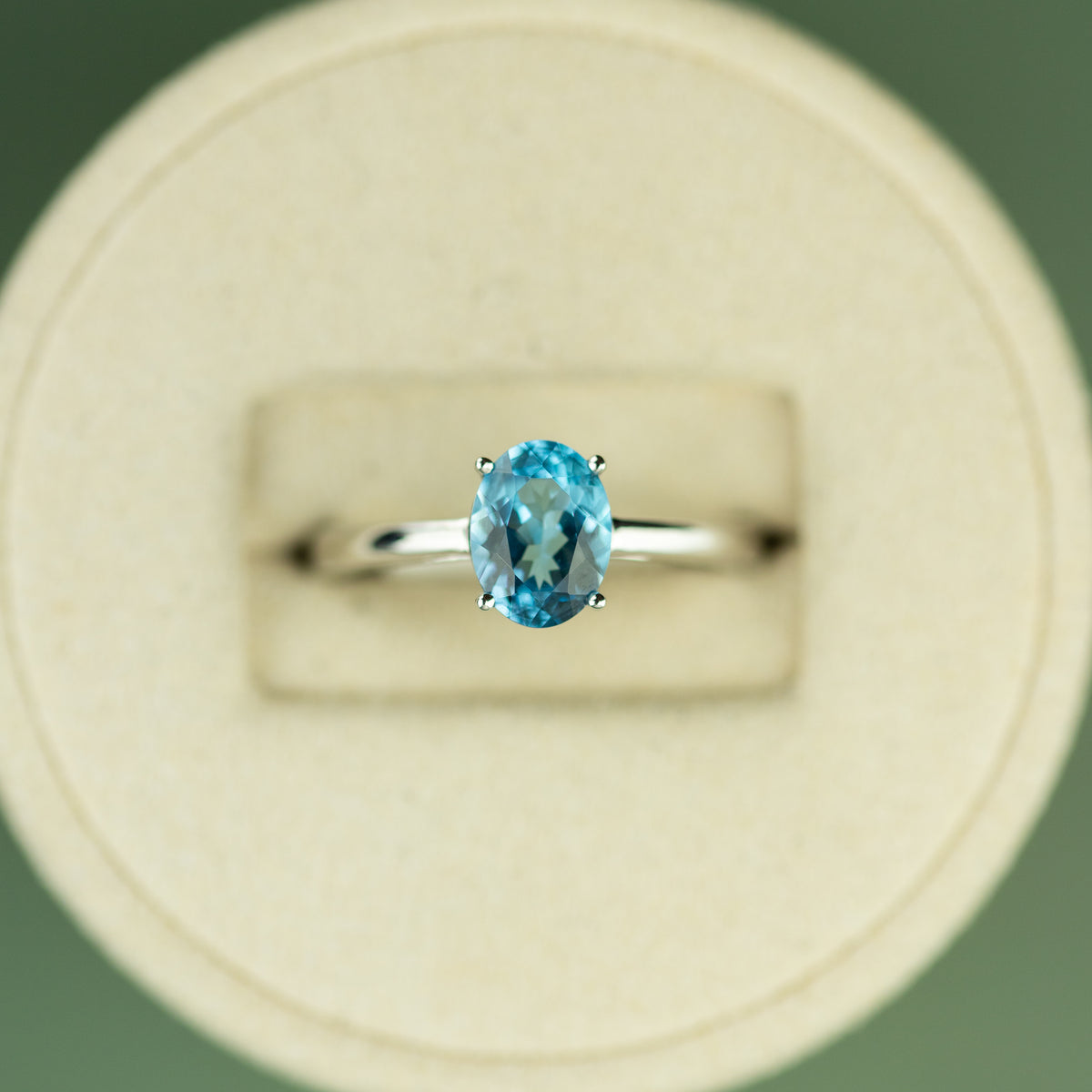 18 Karat White Gold Blue Topaz Oval Cut Ring 1.42ct at RR Jewellers Yarm UK