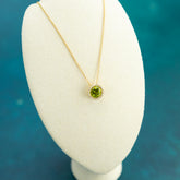 18ct yellow gold round peridot and diamond halo floating pendant