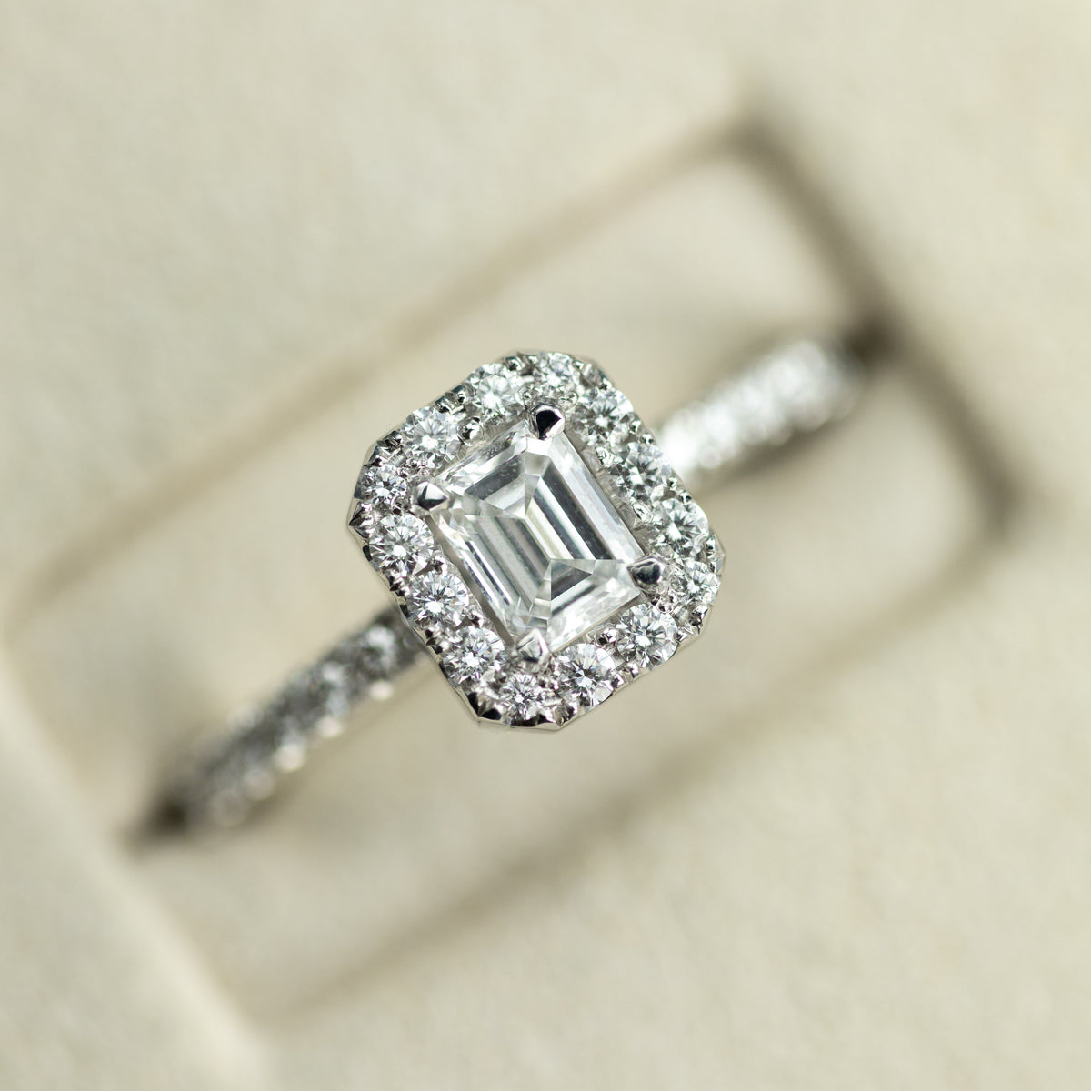 18ct white gold D colour emerald cut GIA diamond halo ring at RR Jewellers UK 